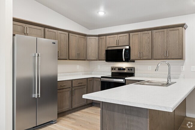 2 habitaciones, 2 baños - 1166 pies cuadrados - Cocina - Windmill Flats Townhomes