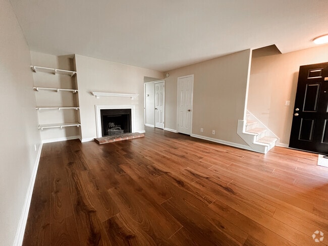 Living Room w/ built-in shelves and fireplace - 5750 Brentwood Trace
