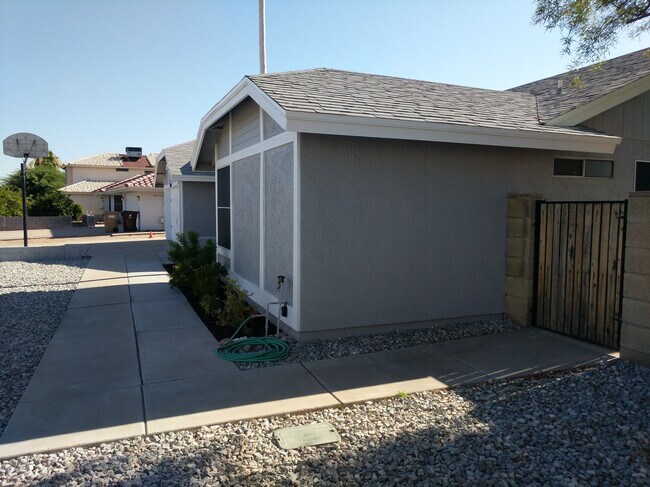 Front of house, facing North - 14101 N 78th Dr