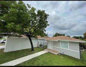 Building Photo - 5881 NW 32nd Ave