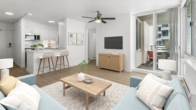 Sala de estar con balcón y piso de superficie dura - SoMa Square