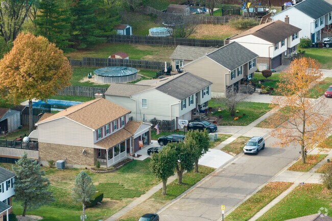 Single-family homes line quiet streets across Harrison, Ohio.