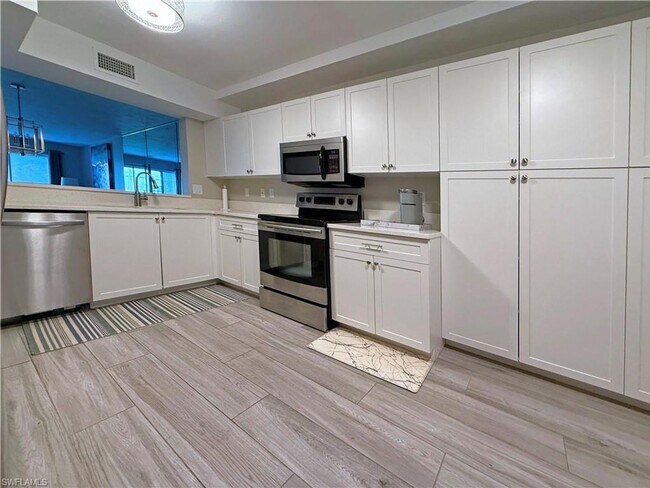 Building Photo - Annual Rental Opportunity! Stylish 2-Bed C...