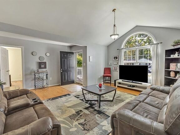 Living room with cathedral ceiling - 5111 Berryridge Terrace