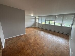 Building Photo - 1061 Queen's Blvd