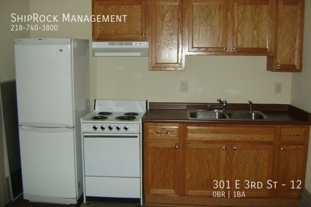 Foto del edificio - 301 E 3rd St