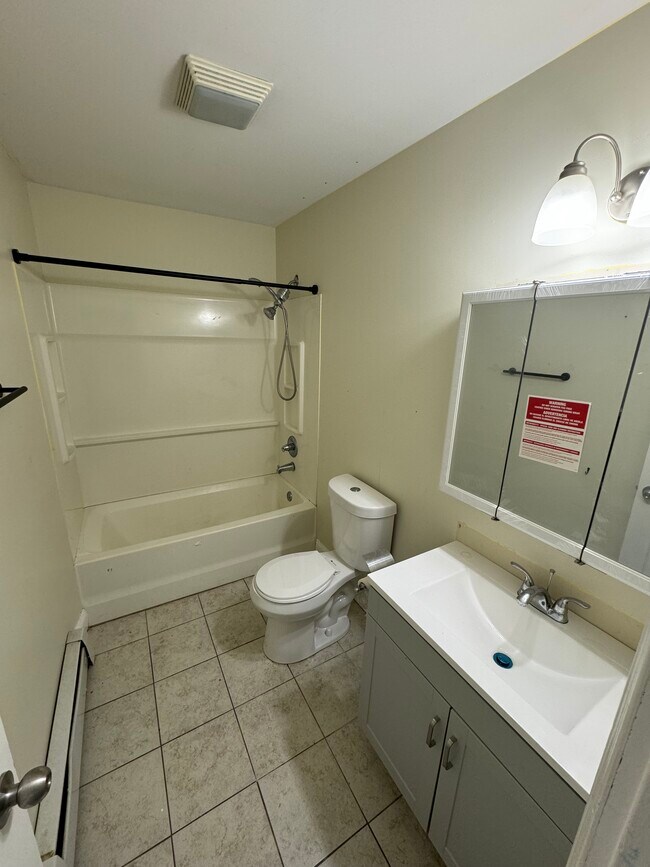 bathroom - new vanity and mirror - 1010 W Main St