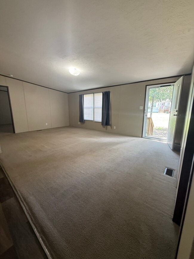 Living room - 380 Pine Tree Loop