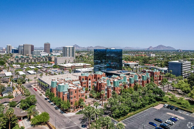 Townhomes sit next to high-rises.