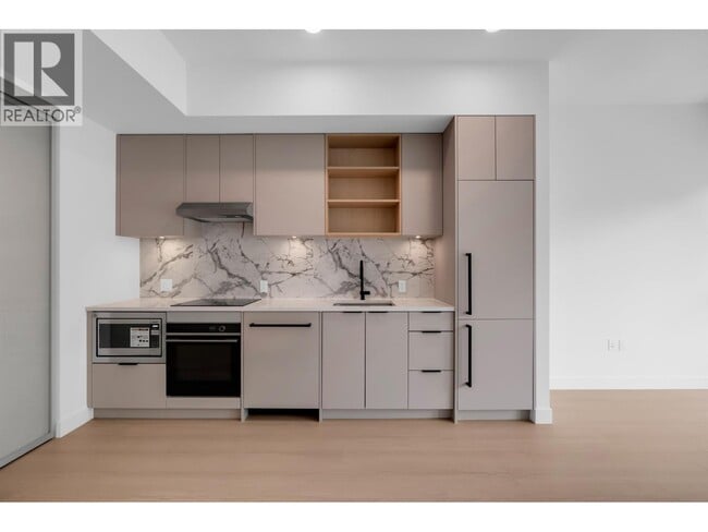 Photo du bâtiment - 422-422 E 3rd St