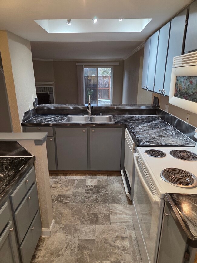 Modern kitchen and new refrigerator - 220 Israel Rd SW