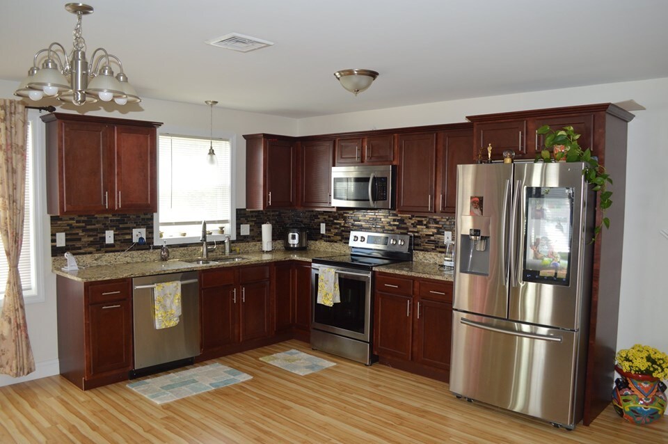 Kitchen with Glass Title Back splash - 12 Gray Coach Ln