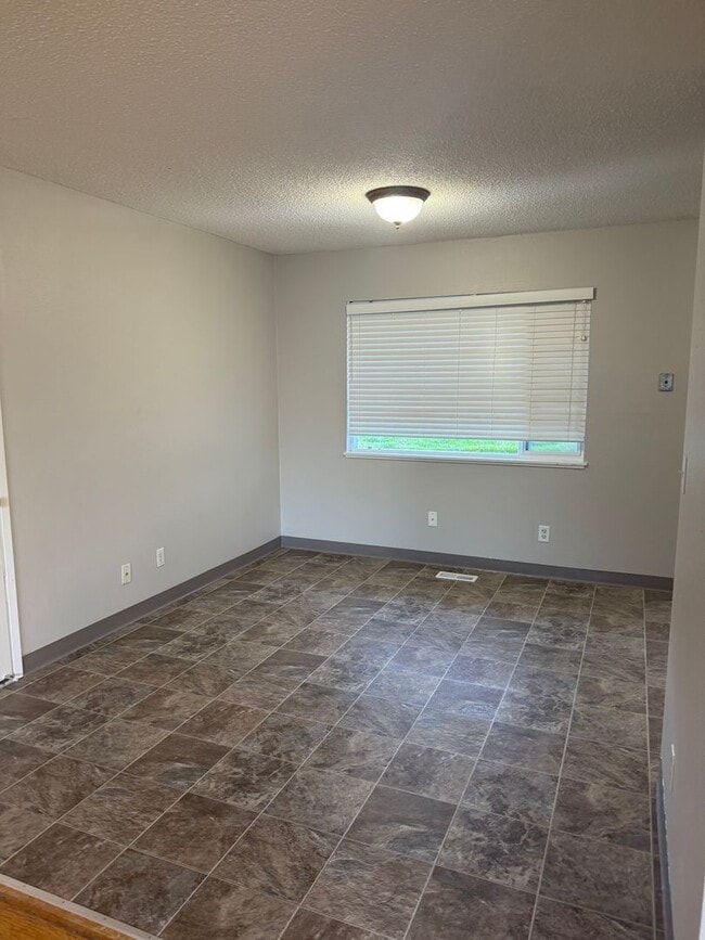 Building Photo - COMING SOON--Beautiful 3 Bedroom with a Living Room, Family Room, Fenced Yard & More!