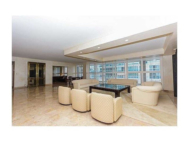 Building Photo - 10155 Collins Ave