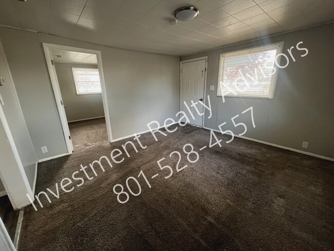Building Photo - Single Family Home in Midvale!