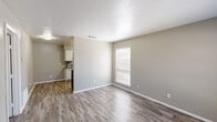 This efficiently designed 510 square foot apartment in Grand Prairie, TX, offers a perfect blend of comfort and style. The single-story layout comprises one bedroom, one bathroom, and an open-concept living area. Upon entry, you're greeted by a bright living room with a large window, providing ample natural light and a view of the surroundings.

The 160 square foot primary bedroom features a ceiling fan and window, ensuring comfort and airflow. The bathroom boasts a modern design with a tiled shower/tub combination and decorative accent strip. The kitchen, while compact, is well-equipped with stainless steel appliances, granite countertops, and a stylish tile backsplash. White cabinetry provides ample storage space.

Throughout the apartment, wood-look flooring adds warmth and durability. Neutral wall colors create a versatile backdrop for various decor styles. The open floor plan allows for easy flow between the living, dining, and kitchen areas, making the space feel larger and more connected. A closet provides additional storage solutions.

This apartment offers a perfect balance of functionality and modern aesthetics, ideal for those seeking a cozy yet stylish living space in a convenient location.