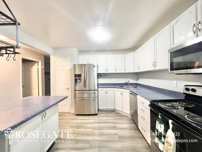 Building Photo - Spacious 3-Bedroom Stacked Townhouse – 1,5...
