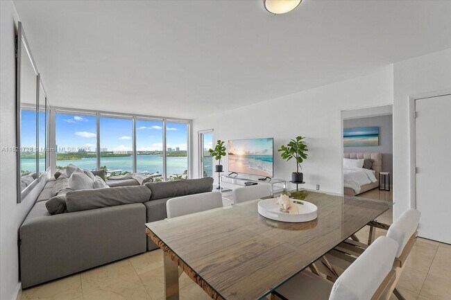Building Photo - 10275 Collins Ave