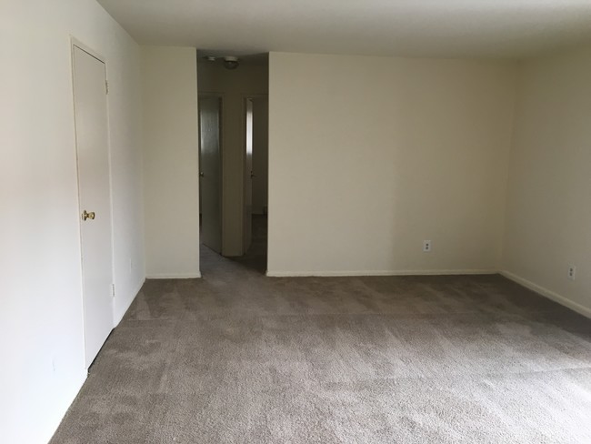 Living room into back rooms - Newport Terrace Apartments