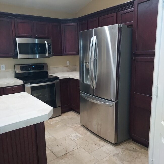 Building Photo - 9447 E Olla Ave