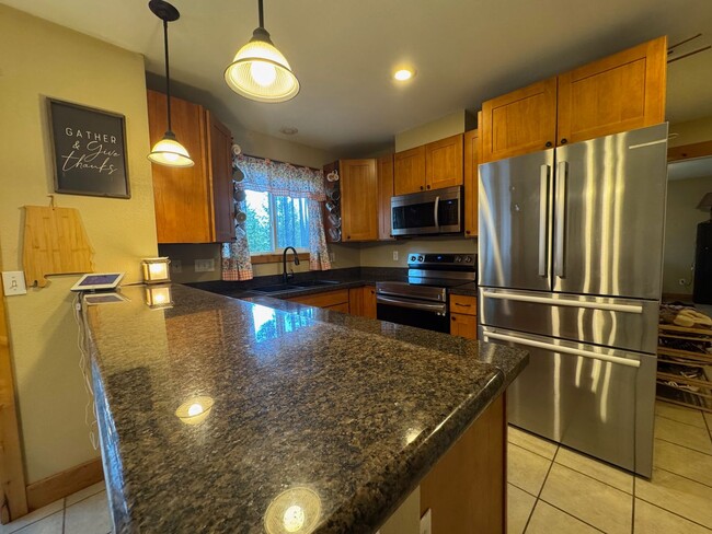Building Photo - Spacious 4-Bedroom Home in Gated Clearwood...