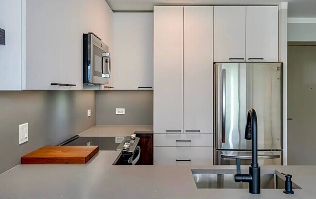 Pantry and leathered quartz countertop and backsplash - 3100 N Lake Shore Dr