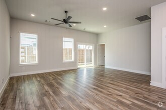 3BR, 2BA - 1,369SF - Living/Dining Area - Canopy Homes at Woodcreek