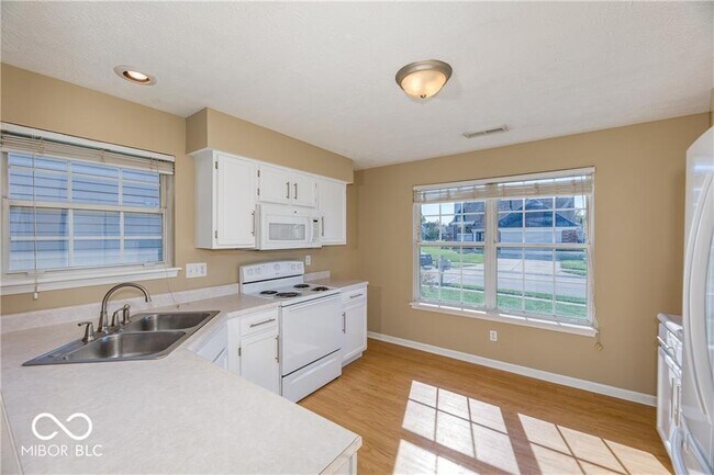 Building Photo - 7178 Woodgate Dr