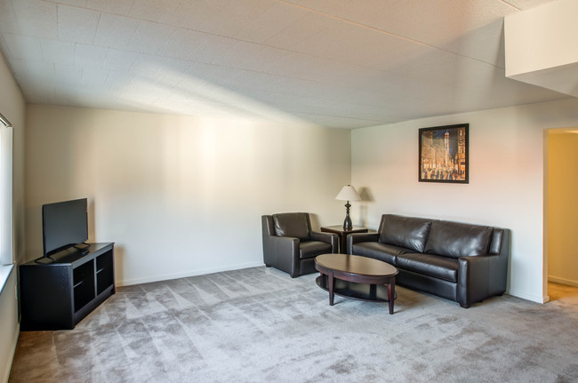 Spacious living area - Sherwood Towers Apartments