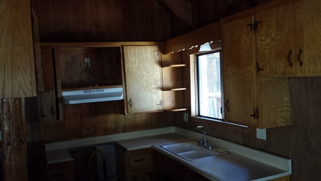 Building Photo - Rustic three bedroom with large lot.