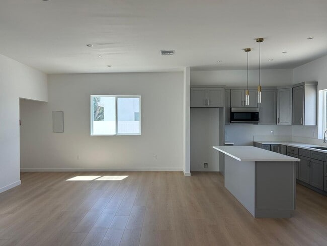 Building Photo - 9308 E Ave T 6