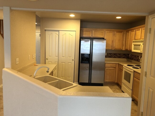 Photo - 18818 E 58th Ave Townhome