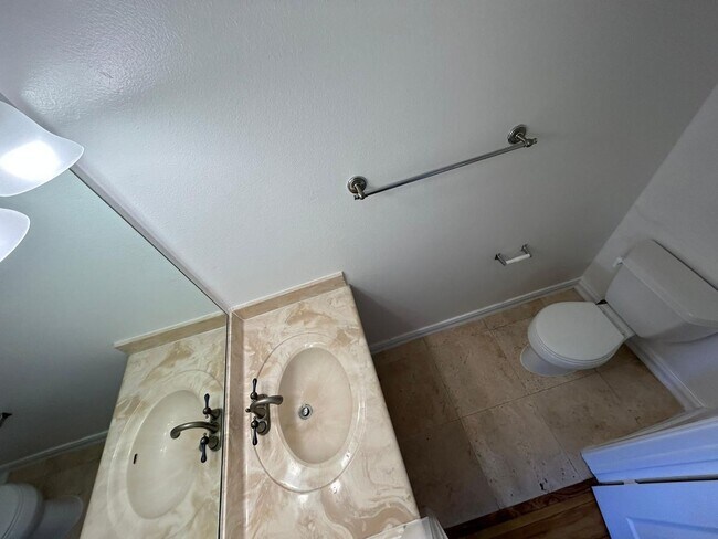 Building Photo - 2 Bedroom 1.5 Bath Townhome. Gated Community. Upgraded & 2 Parking Spaces