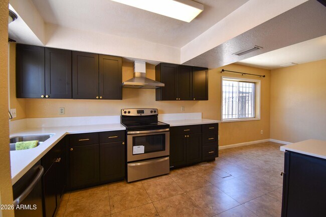 Building Photo - 6525 W Mercer Ln