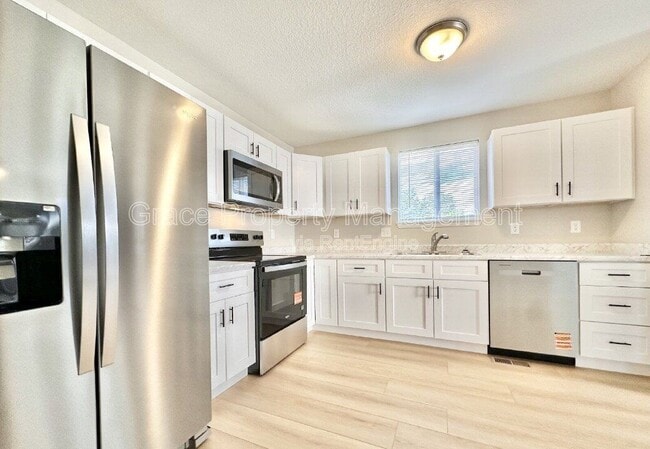 Building Photo - 3451 W 65th Ave