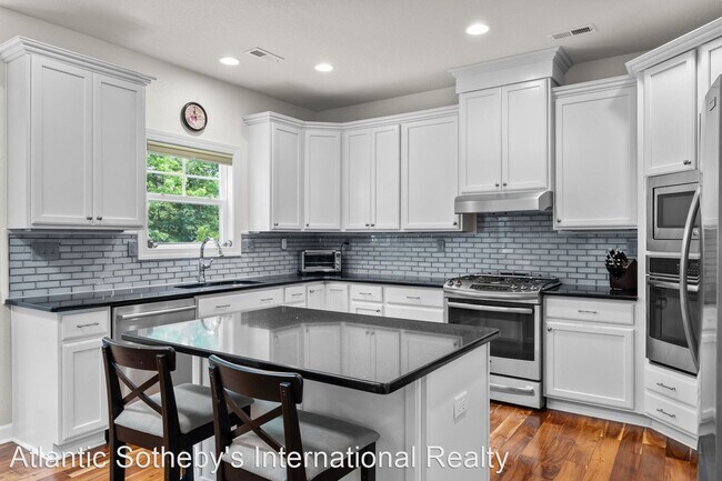 Foto del edificio - 6 br, 4.5 bath House - 2424 Big Cypress Court