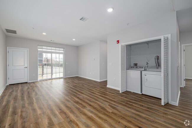 2BR, 2BA - 1,010SF - Living Room/Laundry - The Metropolitan