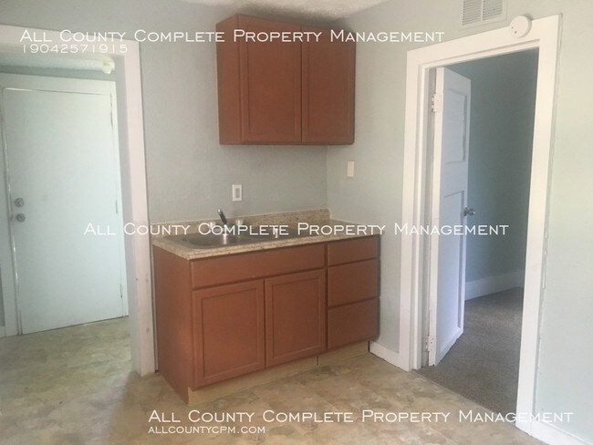 Building Photo - Price Improvement! Four-Bedroom Home