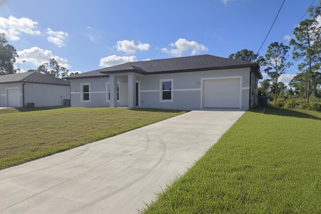 Foto del edificio - Must SEE- 3/2/1 single family home- South Lehigh Acres