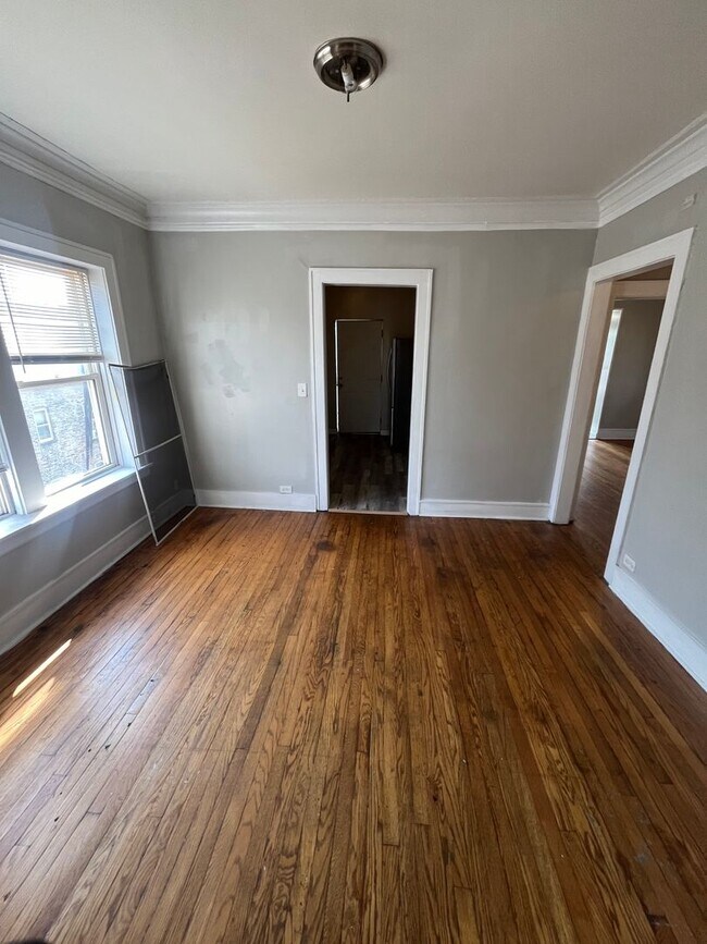 Building Photo - 10934 S Vernon Ave