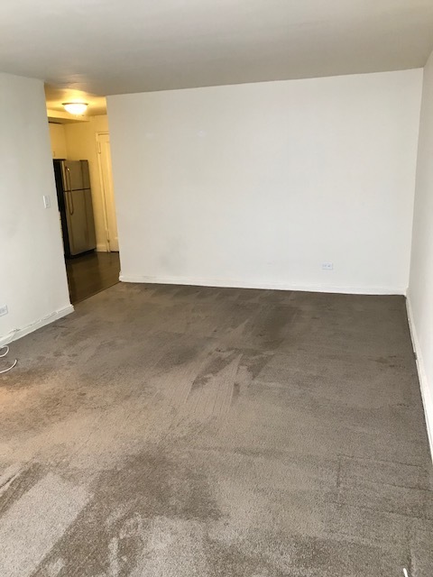 Back of main room showing kitchen - 105-25 67th Ave