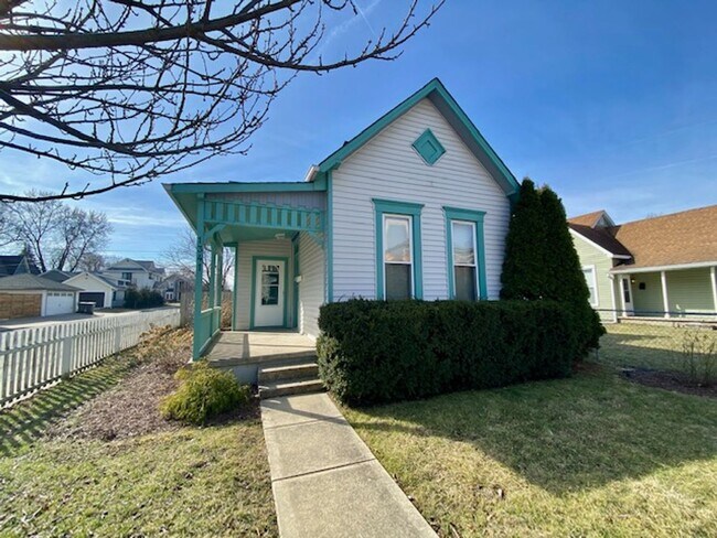 Building Photo - COMING SOON!! Charming Fountain Square victorian cottage w/ white picket fence!