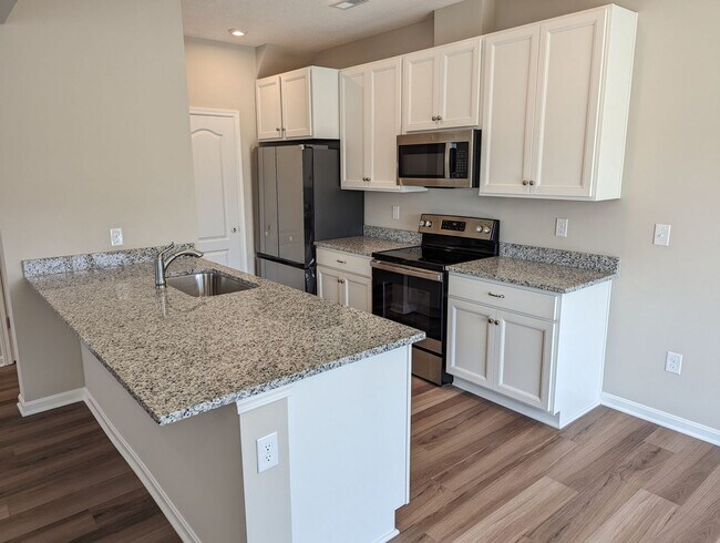Building Photo - AVAILABLE NOW! Brand NEW 3 Bed/2.5 Bath To...