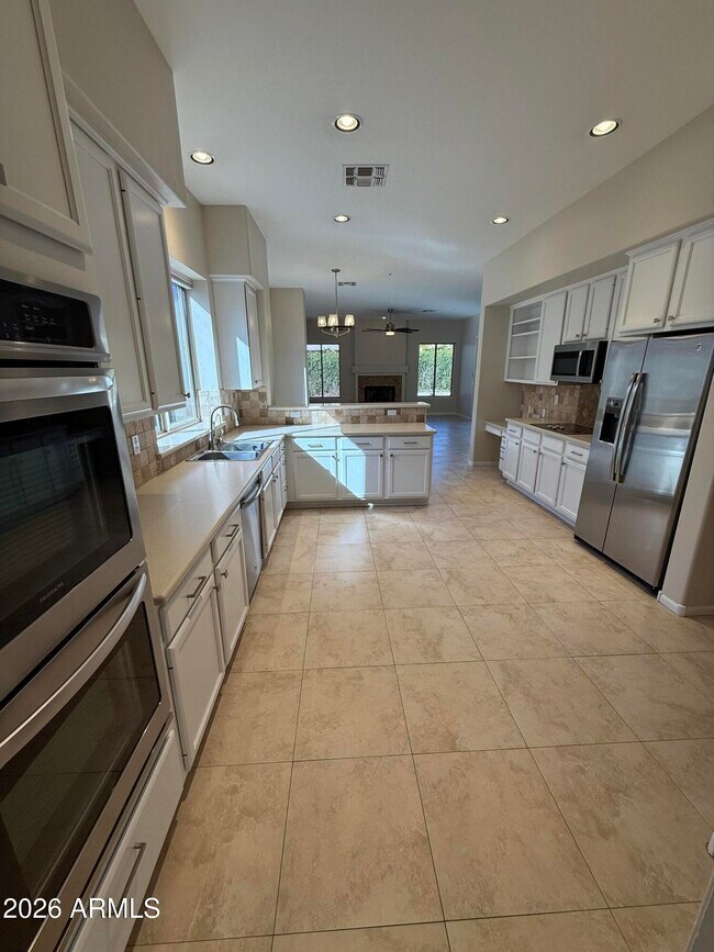 Foto del edificio - 7670 E Quill Ln