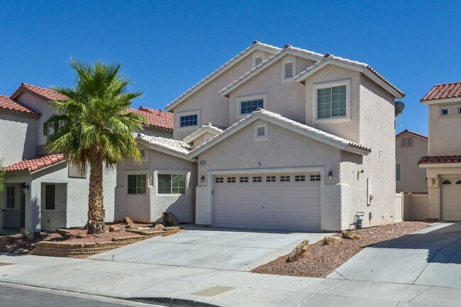 Building Photo - NW 4 Bedrooms!! Primary bed & Bath Downstairs!! Tankless Water Heater!! Low maintenance, Desert l...