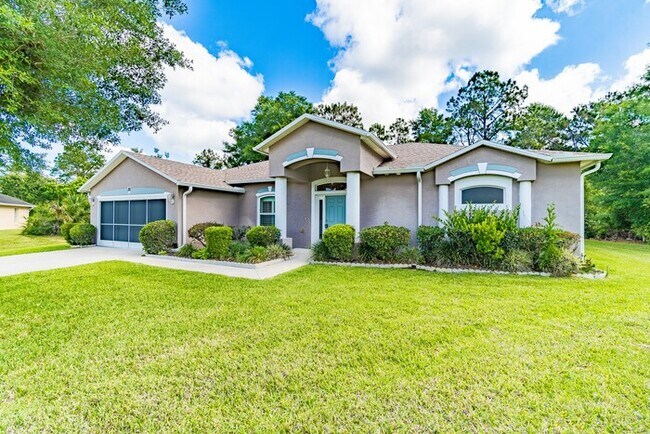 Building Photo - "Discover Unrivaled Living: Your Palm Coas...