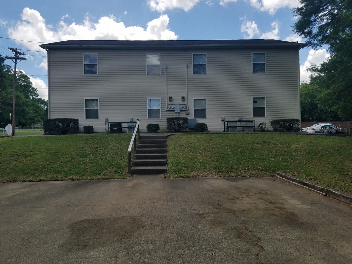 Off street parking and rear of building - 927 Washington St