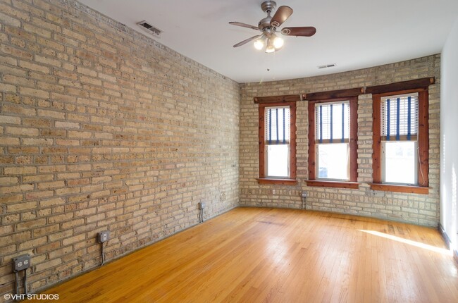 Building Photo - 6449 N Seeley Ave