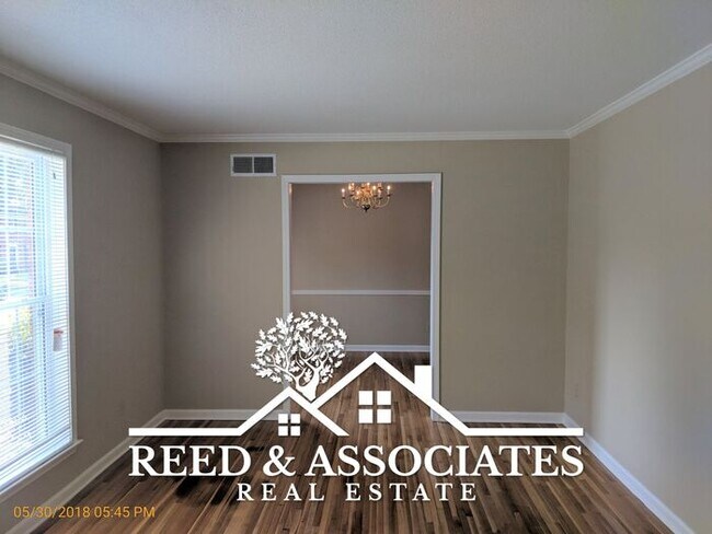 Building Photo - Corner Lot with Fenced Backyard!