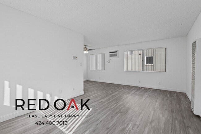 Building Photo - ~1 Month FREE~ Absolutely Gorgeous Top Flo...